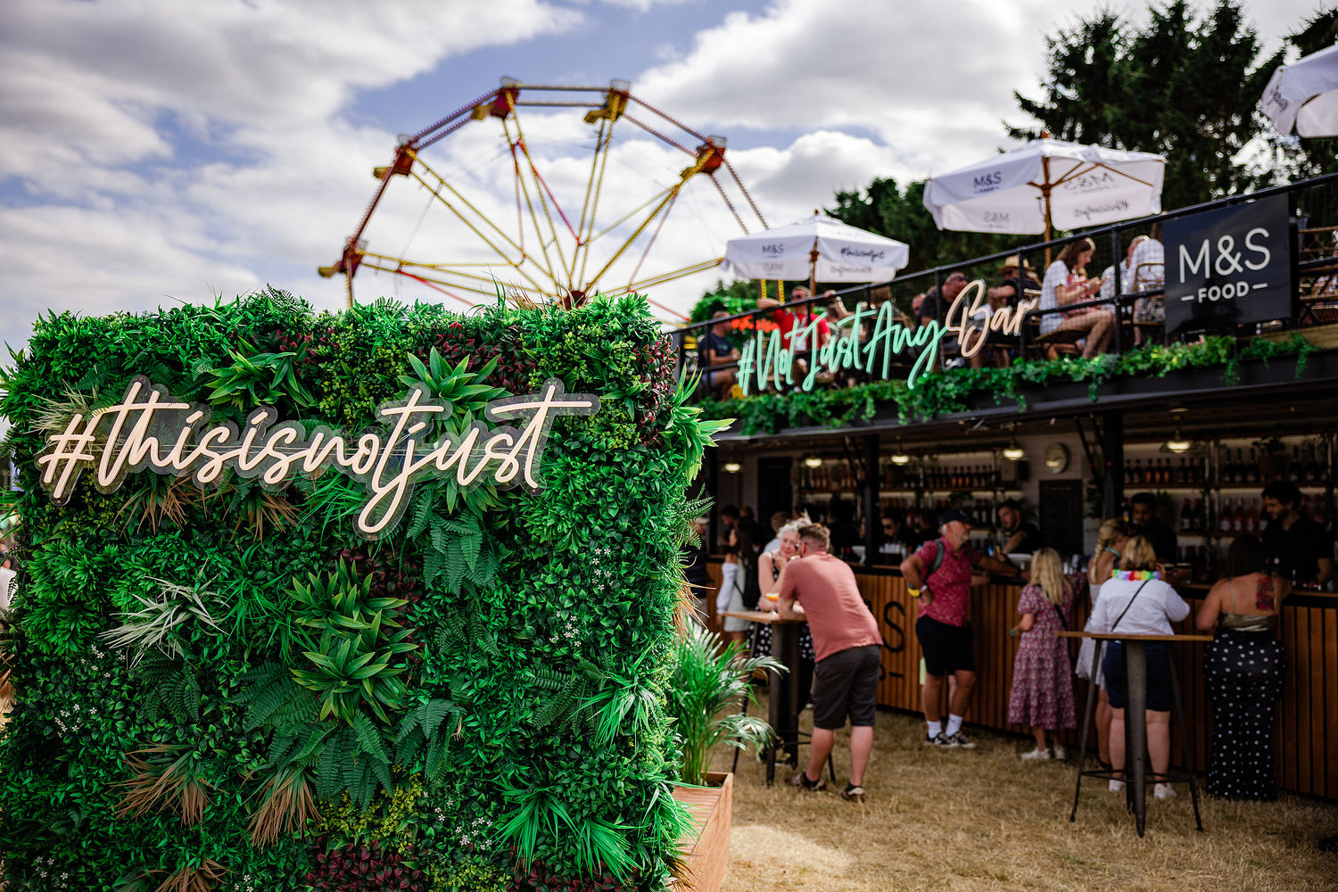 M&S The Big Feastival 2022 Green Wall Panels at the entrance ot the bar