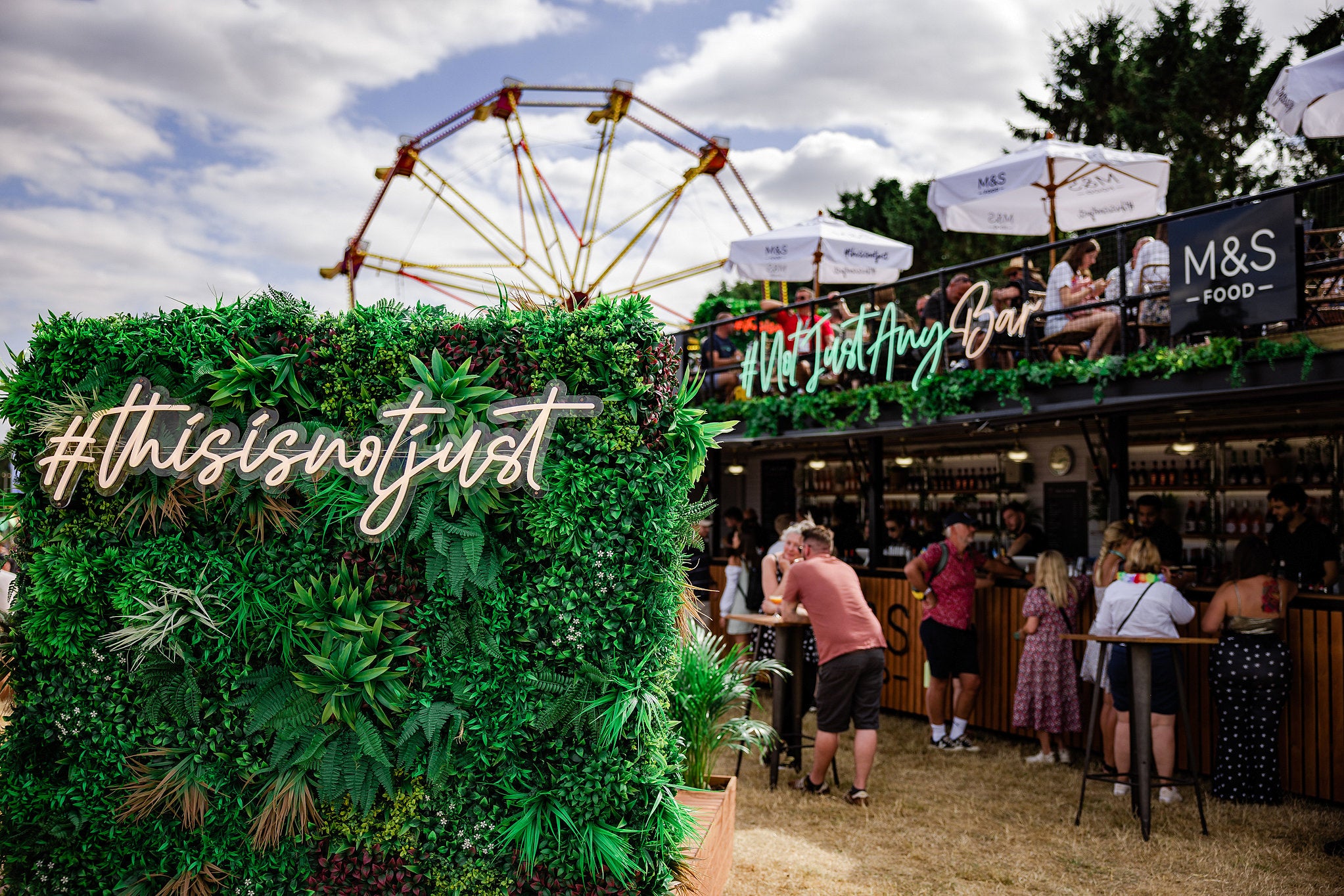 M&S The Big Feastival 2022 Green Wall Panels at the entrance ot the bar