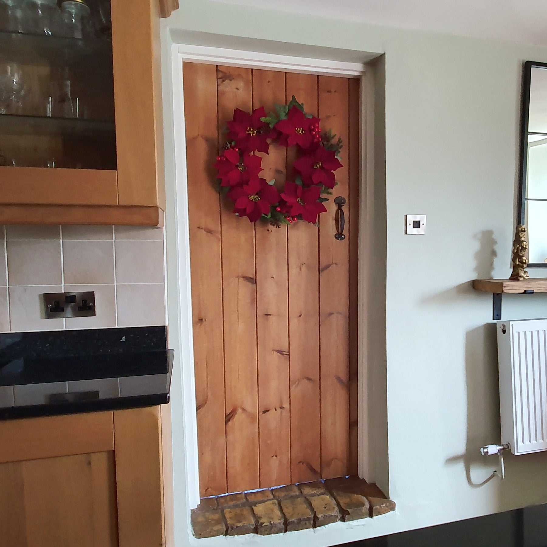 Large Poinsettia Christmas Wreath on Cottage Door