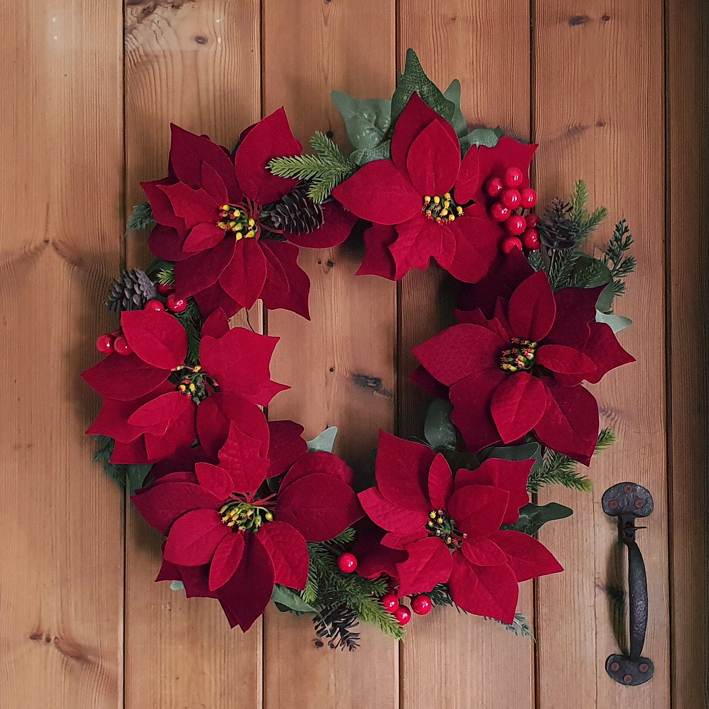 Large Poinsettia Christmas Wreath on Cottage Door