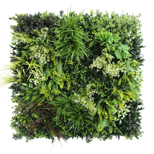 Artificial green plant wall with various types of faux foliage, including large rich green ferns and textured grasses